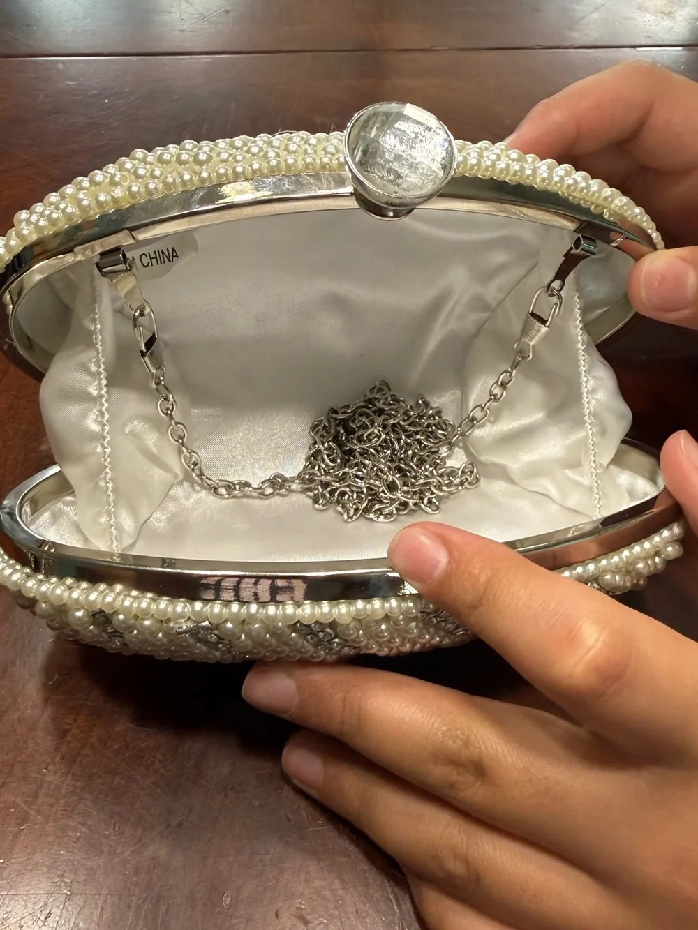 Pearl-Embellished Ivory Evening Clutch with Silver Frame